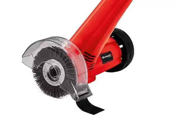 Čistič spár Einhell GC-EG 1410 s vodicím kolečkem a namontovaným krytem kartáče na pracovní straně.